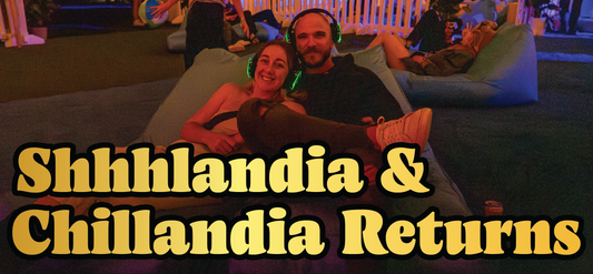 A smiling couple wearing green headphones relaxes on beanbags in a dimly lit, colorful room. Large yellow text in front reads, Shhhlandia & Chillandia Returns.