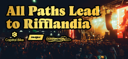 	 A large crowd at an outdoor concert at night with bright stage lights. Bold yellow text reads, All Paths Lead to Rifflandia above sponsor logos for Capital Bike, Helijet, and BC Ferries Connector.